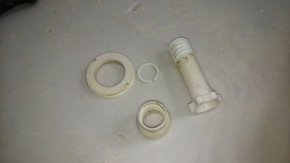 Jacuzzi bathtub jet nozzle removed from the body.
